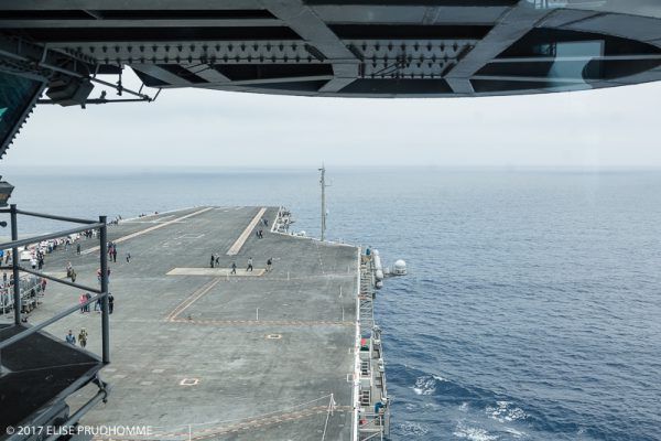 View from the Bridge looking out over the fore of the Nimitz-class aircraft carrier USS Theodore Roosevelt (CVN 71) cruising in the Pacific Ocean off of San Diego, California.
