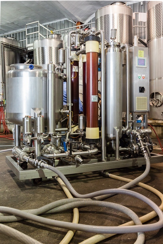 Vertical full length view of the Pall Oenoflow XL Filtration machine busy filtering our Three Feathers 2016 vintage Pinot Noir.