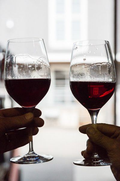 Two comparison glasses of Three Feathers 2016 vintage Pinot Noir