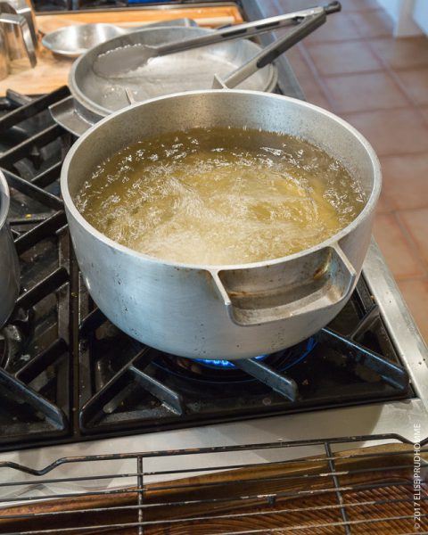 Boiling oil for deeping frying spring rolls