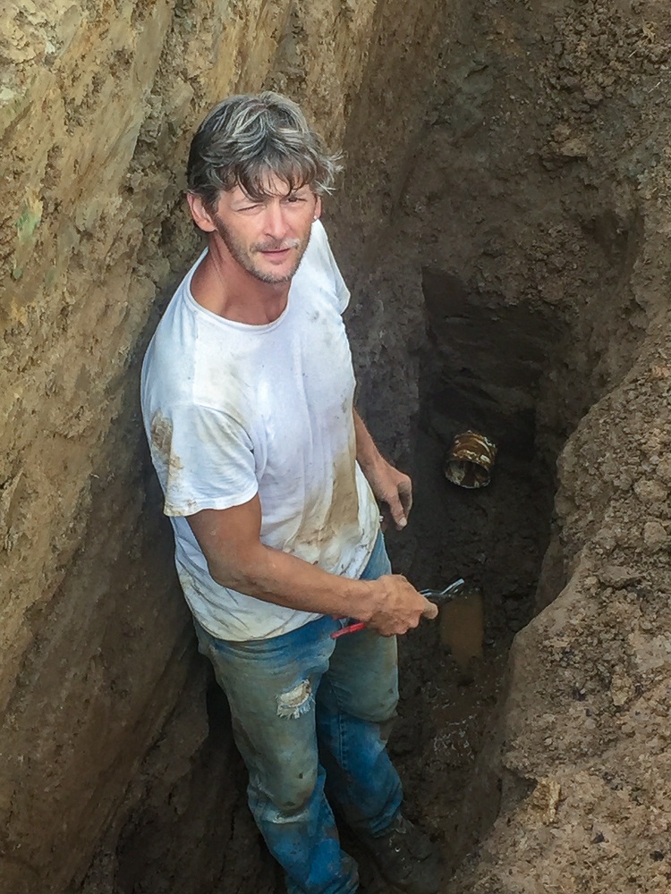 Irrigation repair on Three Feathers Estate & Vineyard, Chehalem Mountain AVA, Willamette Valley, Oregon.