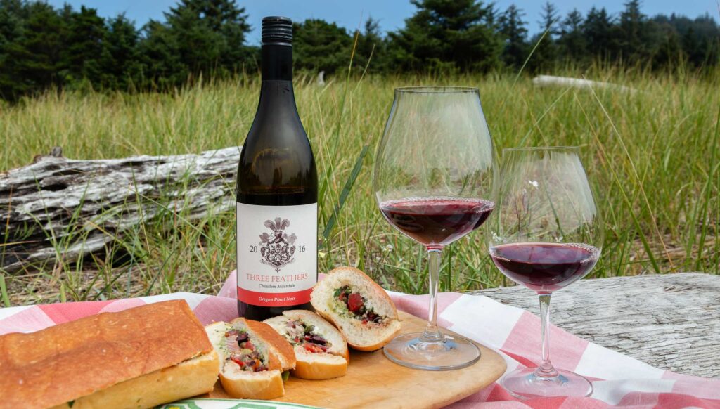 Oregon Coast picnic with Pan Bagnat and Three Feathers Pinot Noir. The 'Pan Bagnat' is a traditional local sandwich NICE Alpes-Maritimes French Riviera Provence-Alpes-Côte d'Azur France