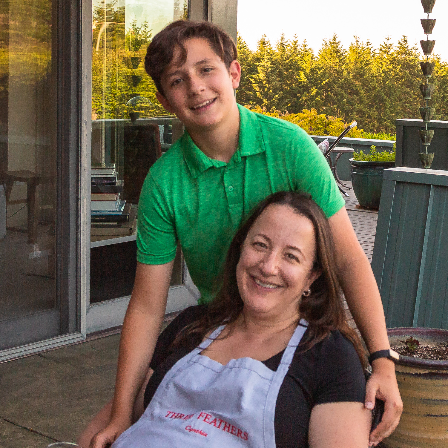 Cynthia Stimac and her son Torio at the Three Feathers 4th annual Memorial Weekend Wine Tasting event.