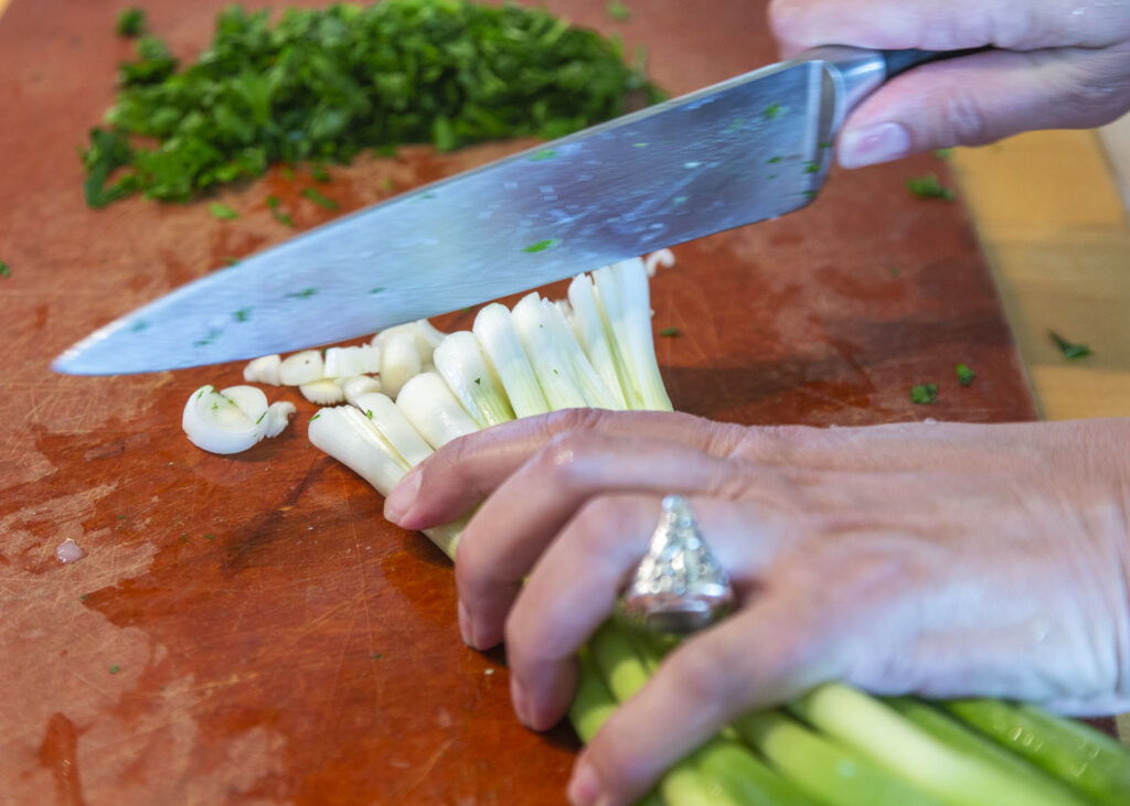 Assemble the ingredients and chop, grate, prepare them individually.  The tuna should be separated into flakes and the scallions should be finely chopped.